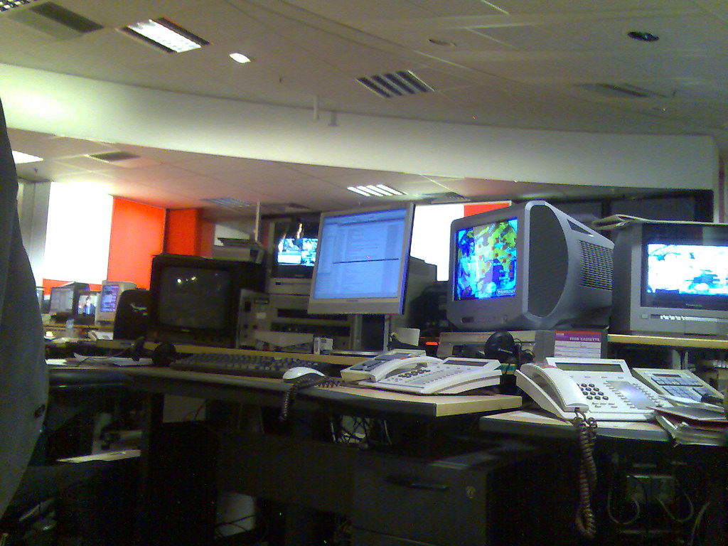Newsroom with screens