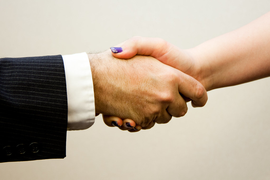 Handshake between two people